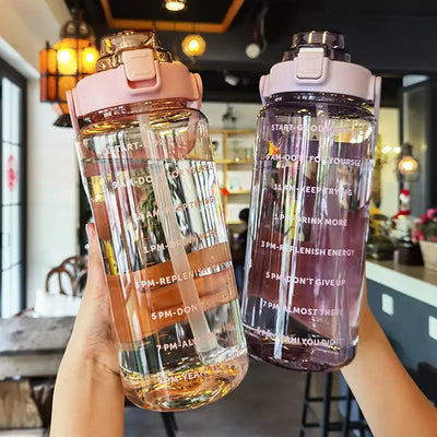 2L Motivational Water Bottle – Leak-proof, translucent design with capacity scale and motivational messages.