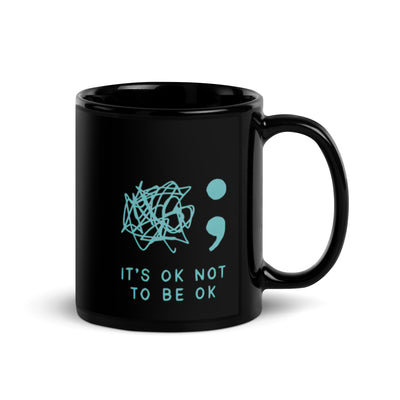 It's Okay Not to Be Okay" teal logo black glossy ceramic mug, 11 oz capacity, sleek glossy finish, hand-wash only.