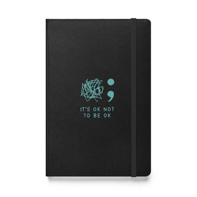 It's Okay Not to Be Okay" teal logo notebook, UltraHyde cover, 80 lined pages, elastic closure, inner pocket.